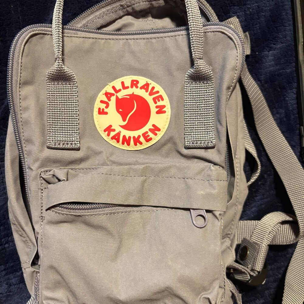 Well used authentic Kanken mini in Flint Grey. Bought from Nordstrom in 2024.
